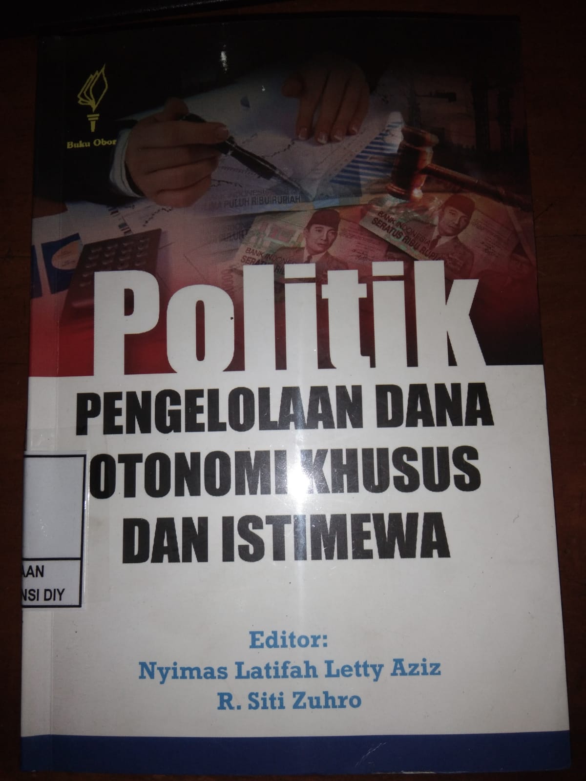 POLITIK PENGELOLAAN DANA OTONOMI KHUSUS DAN ISTIMEWA
